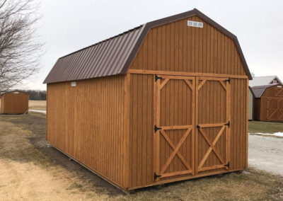 A 10x20 Wood Lofted Barn with Brown metal roof.