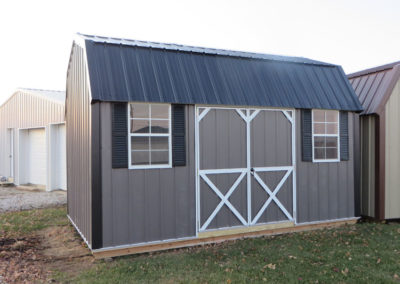A 10x16 Side-Lofted Barn with Charcoal sidewalls, White trim, Black metal roof and optional black shutters.