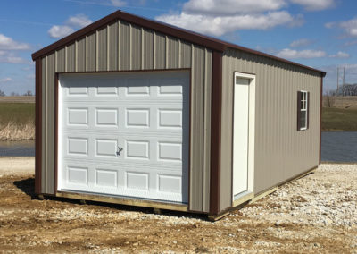 A 12x24 metal Garage with Taupe sidewalls, Brown trim, and option Brown shutters.