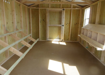 The inside of the 10x14 Utility Shed showing nesting boxes