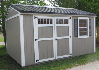 A 10x14 Painted Garden Shed with Clay walls and Black metal roof. Also shown are optional Black shutters, optional light panels on the doors, and optional Ridgelight.